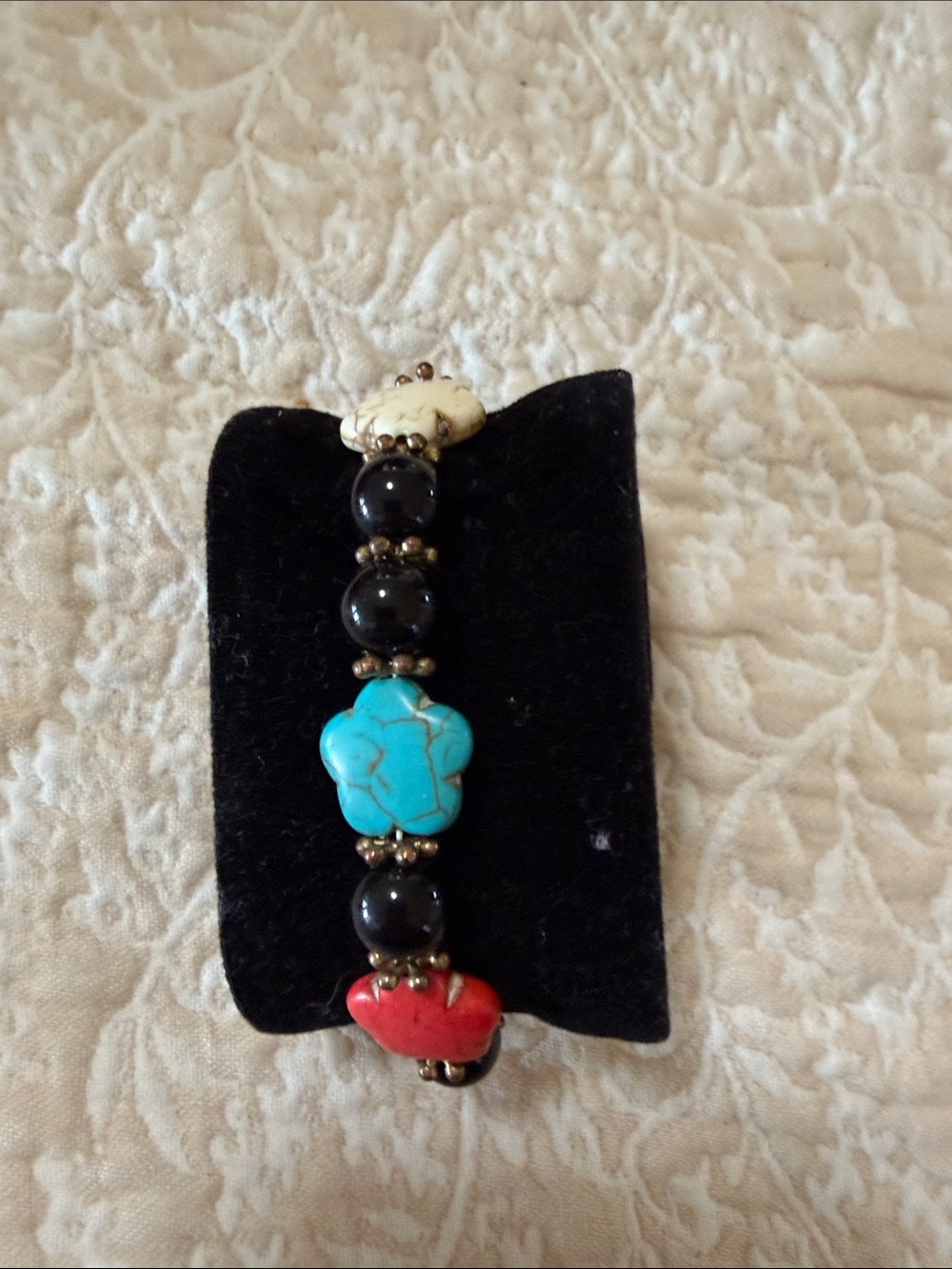 Turquoise Flower and Black Bead Stretch Bracelet with Red Accent